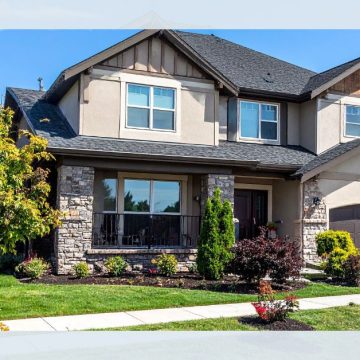 2026 Housing Market Update - 2 storey home with trees and landscaping.
